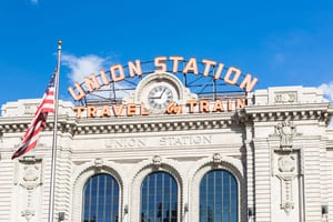 photo of a blue sky behind the front of Union Station in Denver, Colorado