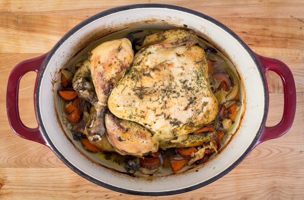 photo of herb-roasted chicken in a crock pot after it's done cooking, showing what your cannabis oil crock pot recipe could look like