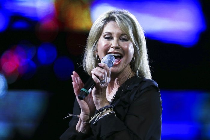 Chile Vina del Mar Song Festival FILE - In this Feb. 23, 2017, file photo, Olivia Newton-John performs during the Viņa del Mar International Song Festival at the Quinta Vergara in Viņa del Mar, Chile. Newton-John said she has been diagnosed with cancer for the third time in three decades. The four-time Grammy winner, who will turn 70 on Sept. 26, told Australian news program